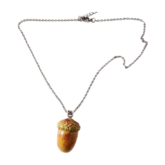 The Glam Bijoux handmade acorn clay necklace, symbolic jewellery of growth and potential.