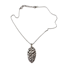 The Glam Bijoux handmade pinecone clay necklace, symbolic jewellery of renewal and strength.