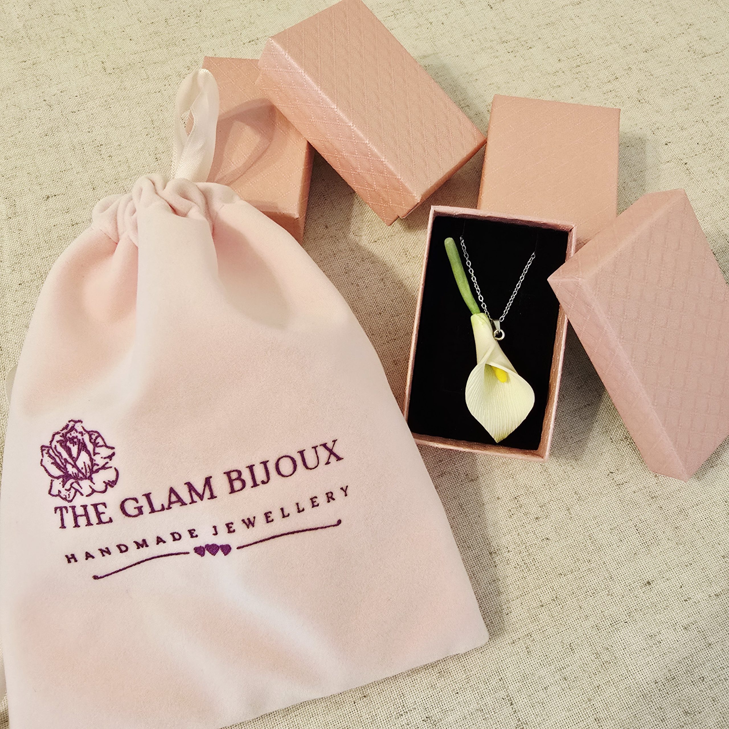 Calla Lily Necklace by The Glam Bijoux presented in luxury pink box and velvet bag.
