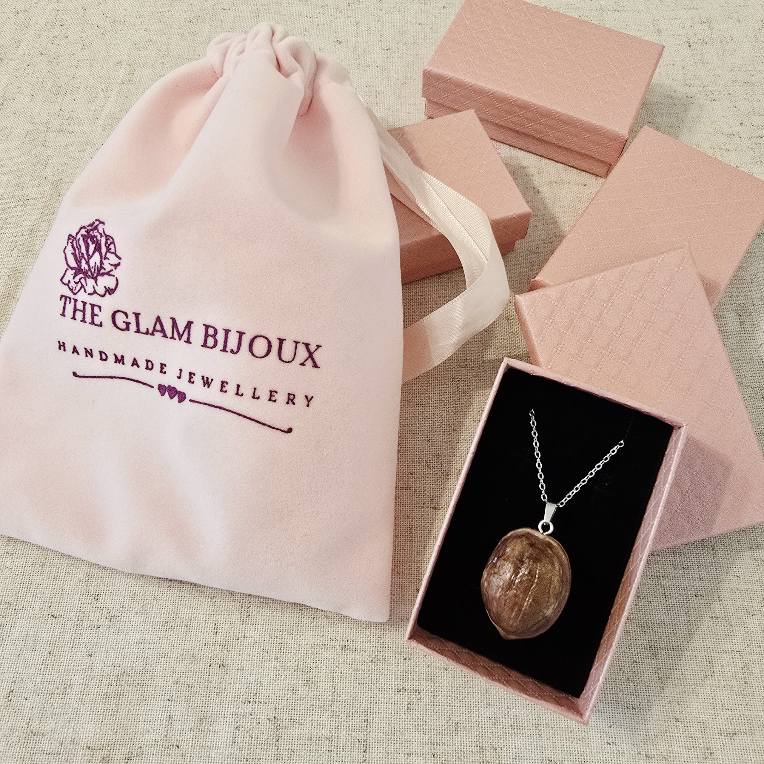 Walnut Necklace by The Glam Bijoux displayed in pink box and custom pink velvet bag.