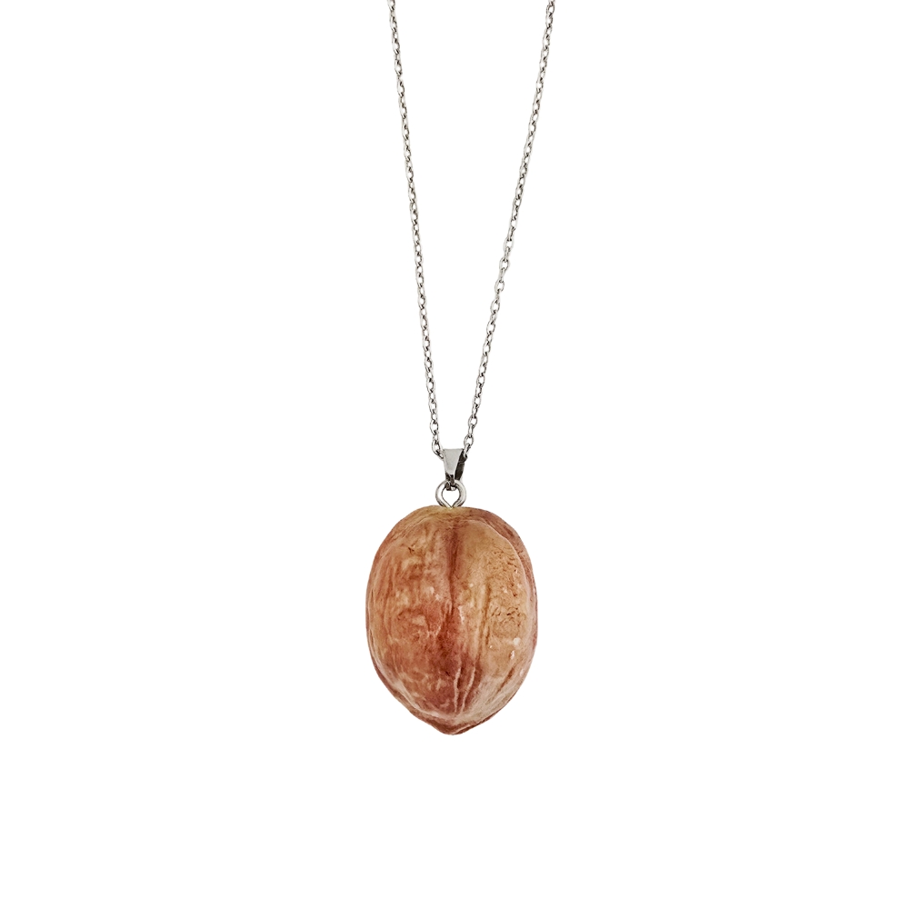The Glam Bijoux walnut-inspired clay necklace, symbolic jewellery of protection and strength.