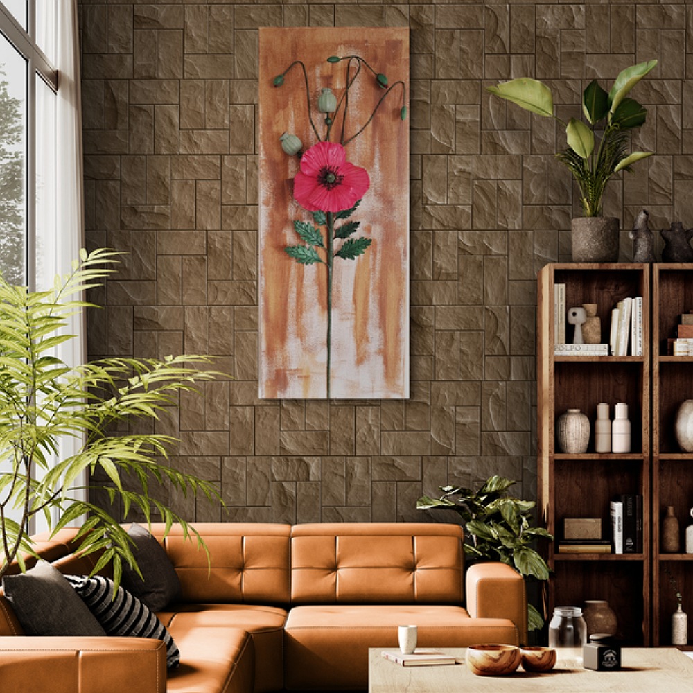 Handcrafted clay poppy wall art displayed in a living room with brown walls and neutral-toned furniture.