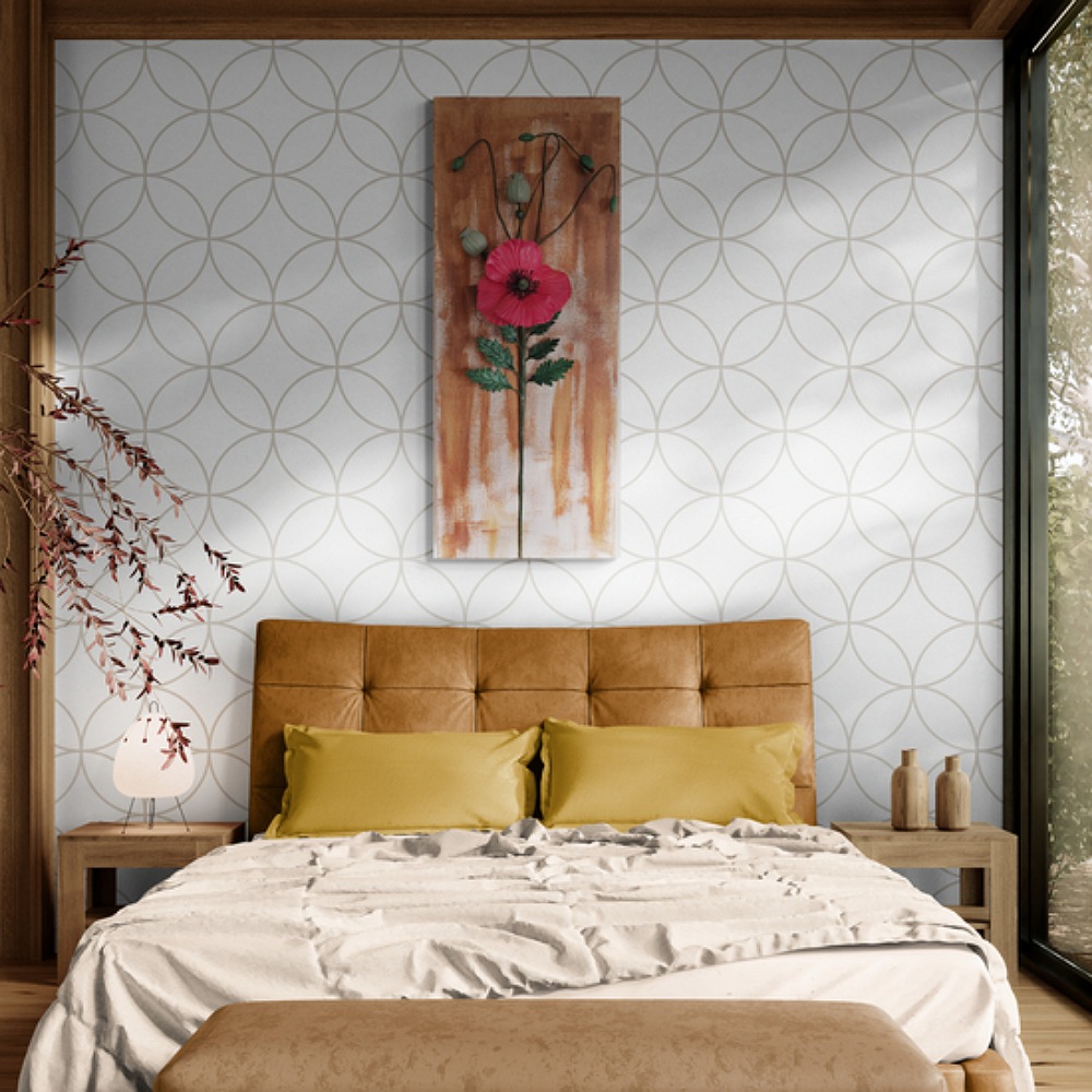Elegant clay poppy artwork hanging on a white wall with gold accents, adding a modern touch to the space.